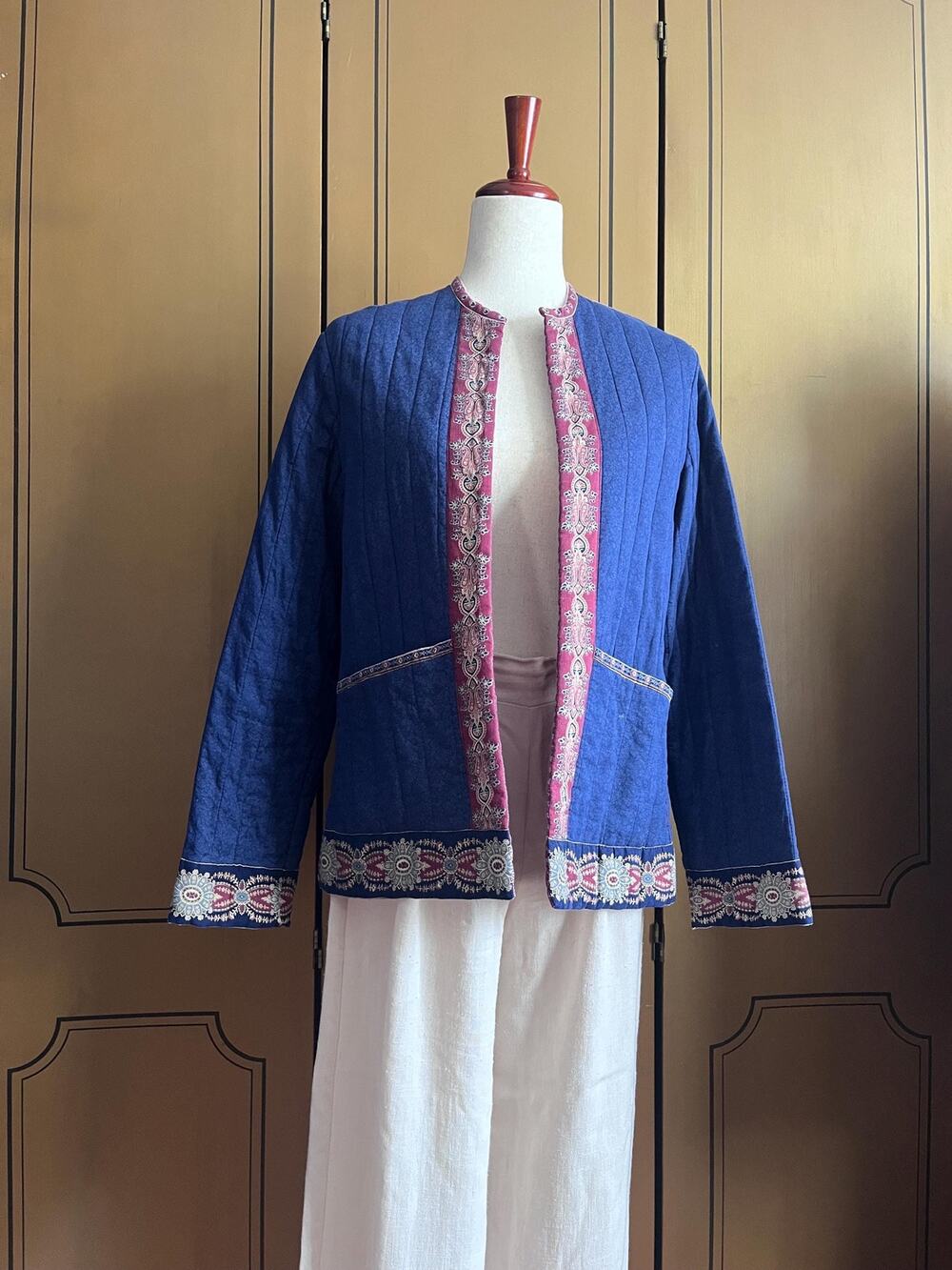 Reversible jacket in blue and red, size M